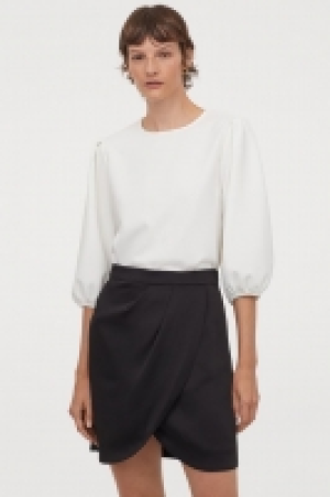 Falda cruzada 15.99 €