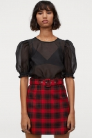 Falda corta con cinturón 5.99 €