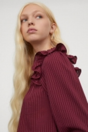 Blusa con volantes 14.99 €