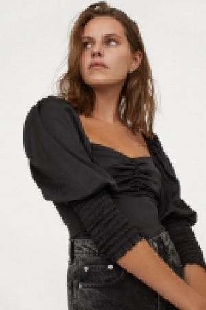 Blusa con manga puffy 12.99 €