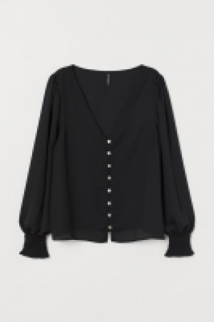 Blusa con detalles fruncidos 11.99 €