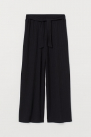 Pantalón de punto cropped 4.99 €