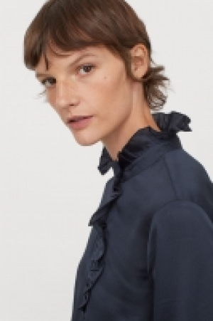 Blusa con volantes 17.99 €