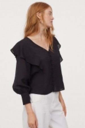 Blusa con volantes 10.99 €