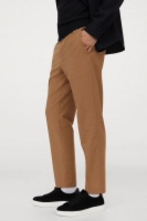 Pantalón cropped con lana 29.99 €