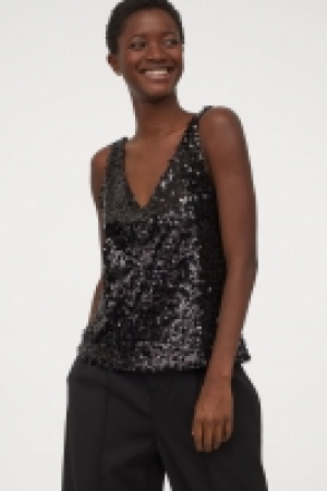 Top en V con lentejuelas 8.99 €