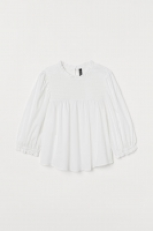 Blusa fruncida de algodón 4.99 €