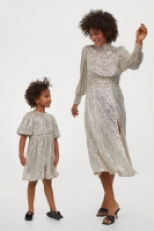 HM  Vestido puffy de lentejuelas