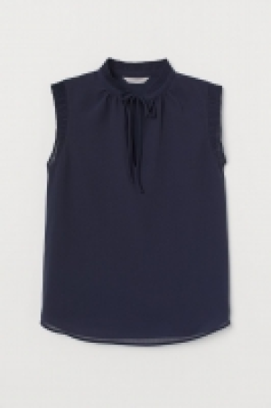 HM  Blusa con cuello plisado