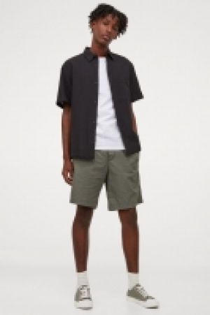 Pantalón corto en mezcla lino 11.99 €