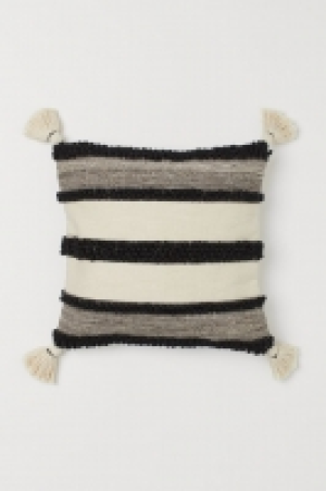 Funda de cojín con borlas 13.99 €