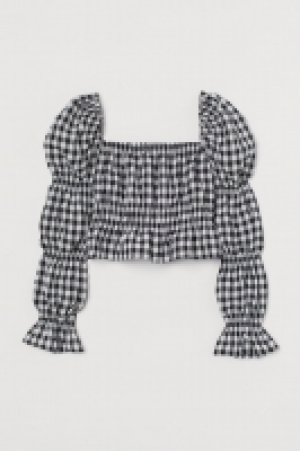 Top cropped con manga puffy 10.99 €