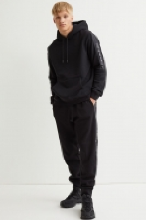 Joggers con franjas 10.99 €
