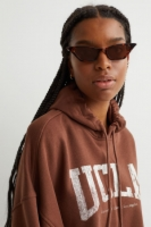 Sudadera cropped con capucha 5.99 €