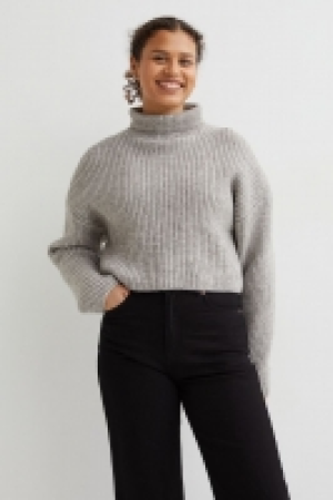 Jersey cropped de cuello alto 17.99 €