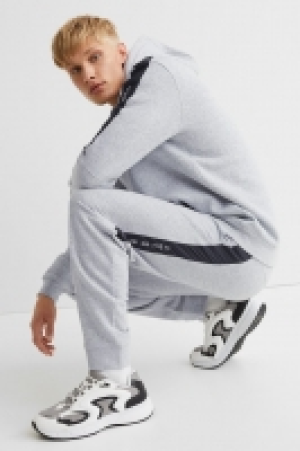 Joggers con franjas 14.99 €