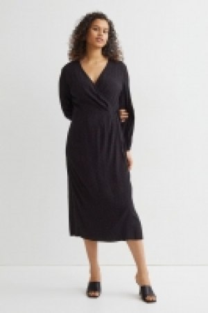 Vestido cruzado con estampado 15.00 €