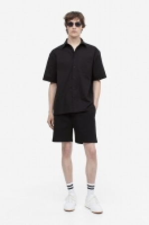 Pantalón corto de algodón Relaxed Fit 12.99 €