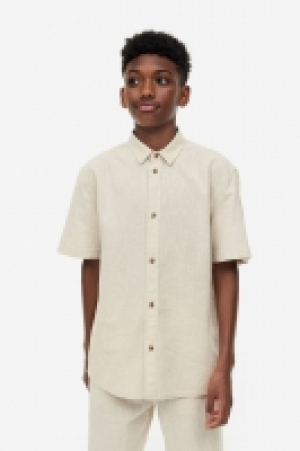 Camisa en mezcla de lino 9.99 €
