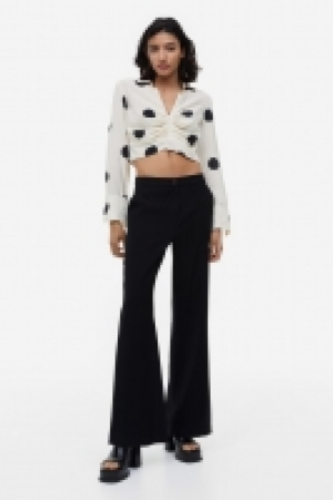 Pantalón acampanado 14.99 €