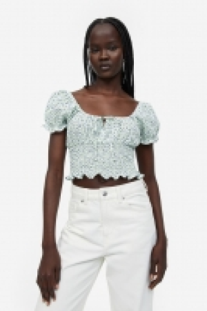 Blusa fruncida con manga puffy 9.99 €