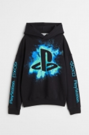 Sudadera oversize con capucha y motivo estampado 10.99 €