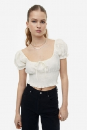 Blusa fruncida con manga puffy 8.99 €