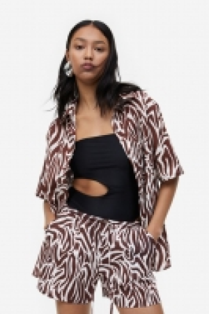 Pantalón corto en mezcla de lino 5.99 €