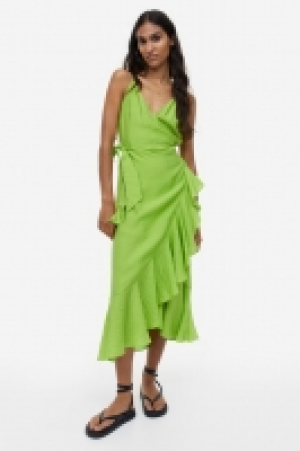 Vestido cruzado con volante 14.99 €