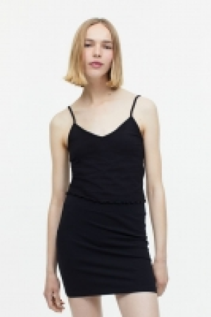 Top cropped de tirantes 3.99 €