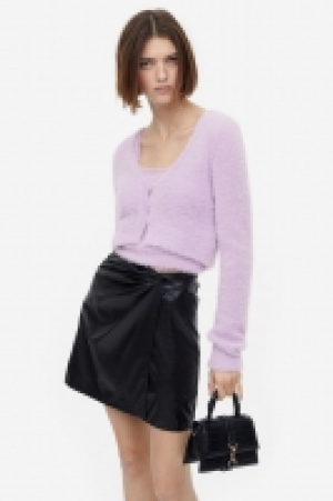 Cárdigan efecto pelo 9.99 €