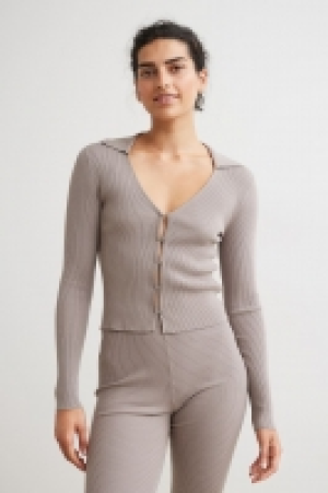 Cárdigan en punto de canalé 17.99 €