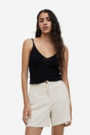Pantalón corto en mezcla de lino 15.99 €