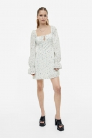 Vestido de crepé con manga puffy 17.99 €