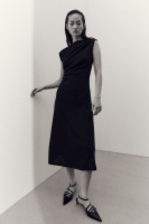Vestido drapeado de punto 14.99 €