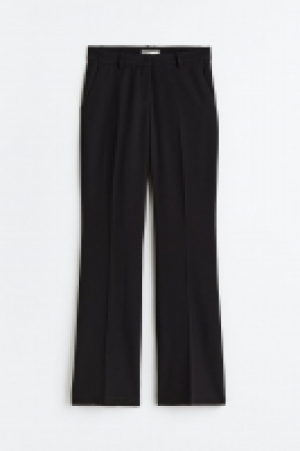 Pantalón acampanado de sarga 9.99 €