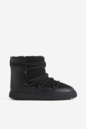 Botas acolchadas con cordones 29.99 €