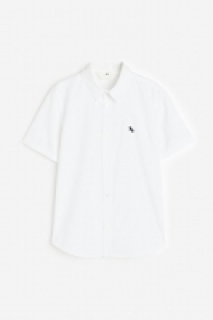 Camisa de algodón de manga corta 6.99 €