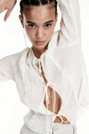 Top vaporoso con lazadas 6.99 €