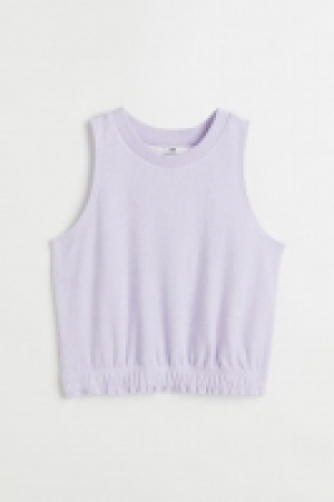 Top sin mangas cropped en tejido rizado